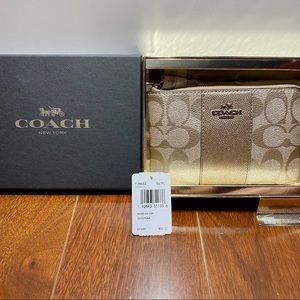 Unused Coach boxed wristlet